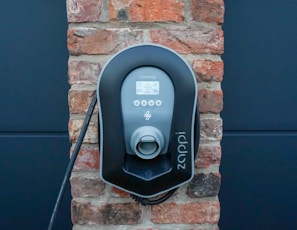 black and gray wall mounted telephone